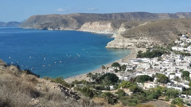 The white village and turquoise bay of Agua Amarga in Cabo de Gata