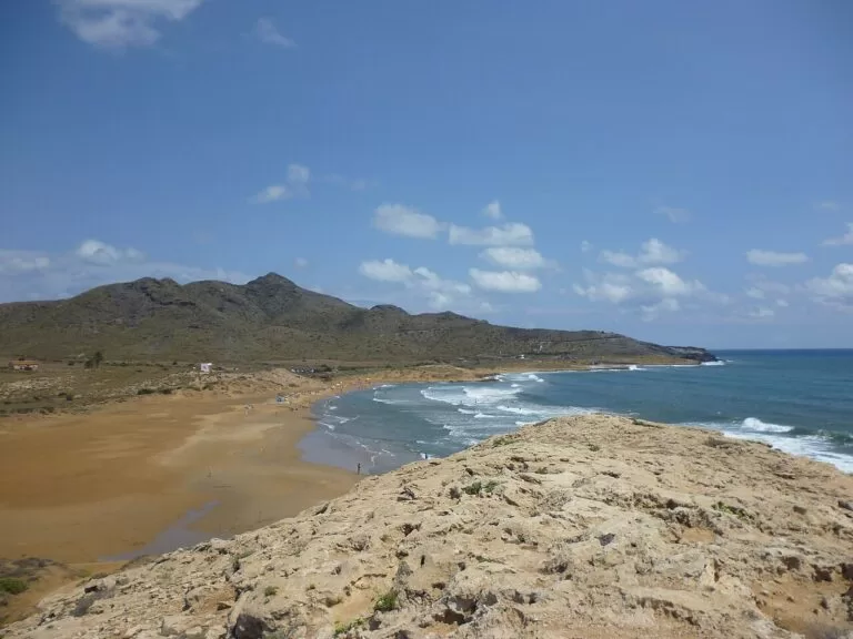Dunes and a long empty beach in Calblanque regional park