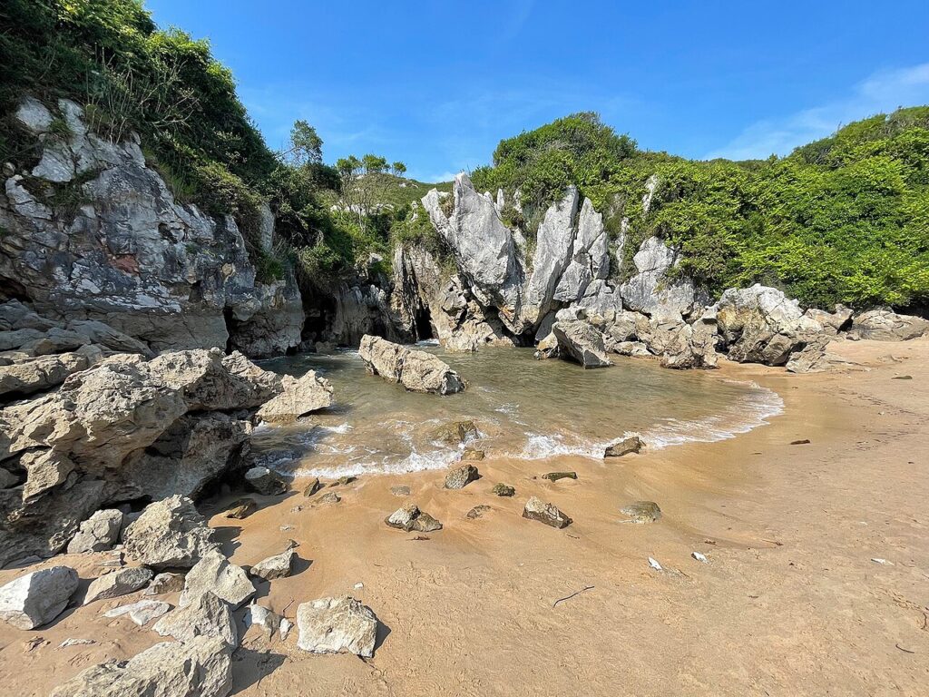 Playa de Gulpiyuri, the inland sinkhole beach near Llanes in Asturias