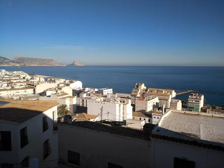 White houses of Altea old town above the blue Mediterranean