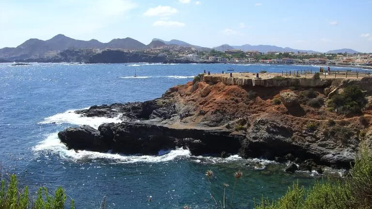Dark rocks and clear blue sea at Cabo de Palos