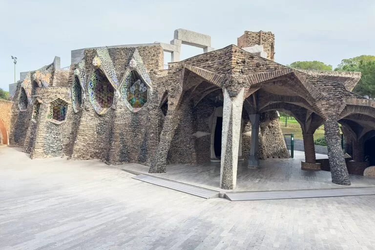 The brick and stone exterior of the Colonia Guell crypt by Gaudi